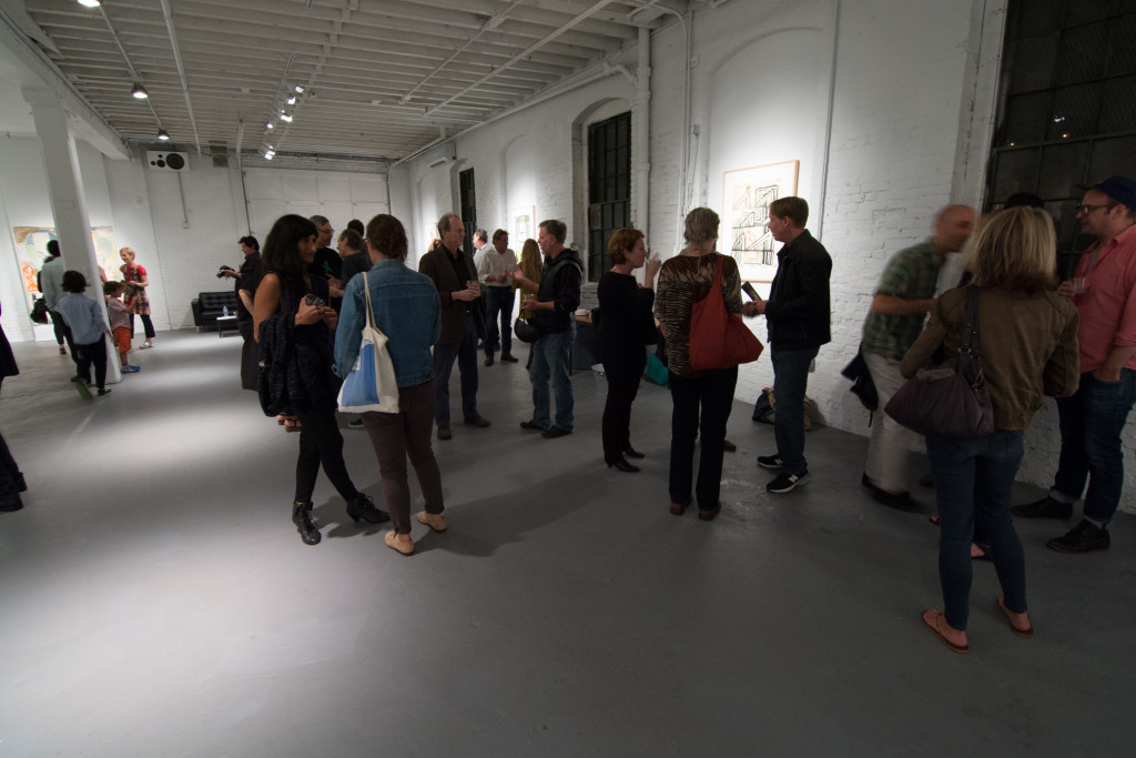 Visitors to PROTO Gallery attending the PAPER GIANTS opening reception