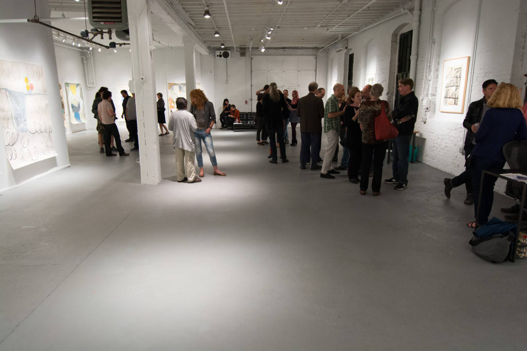 Visitors to PROTO Gallery attending the PAPER GIANTS opening reception