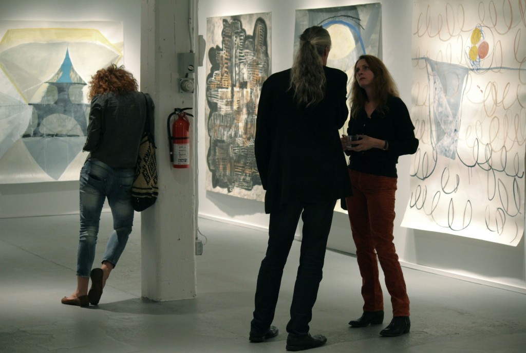 Visitors to PROTO Gallery attending the PAPER GIANTS opening reception