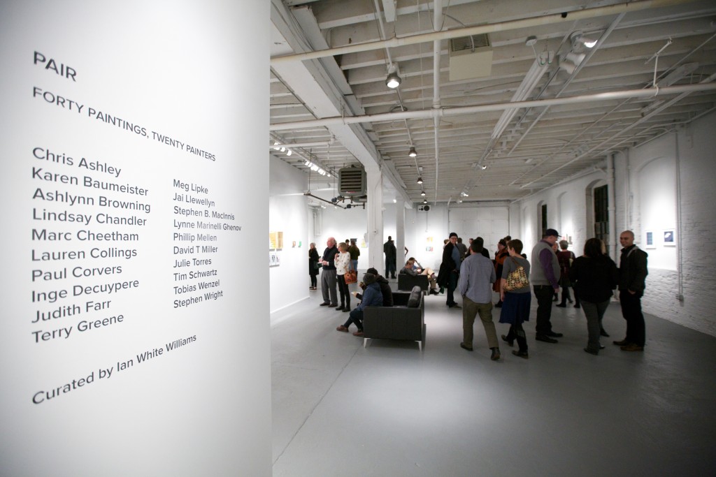 Visitors at the PAIR opening reception at PROTO Gallery