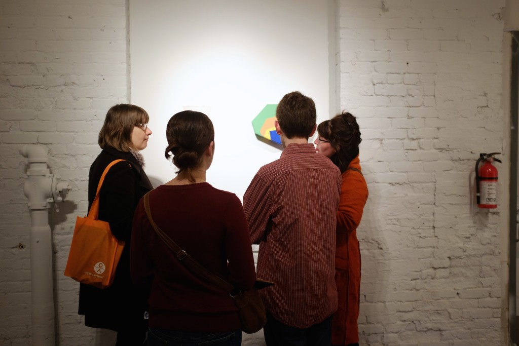 Visitors at the PAIR opening reception at PROTO Gallery