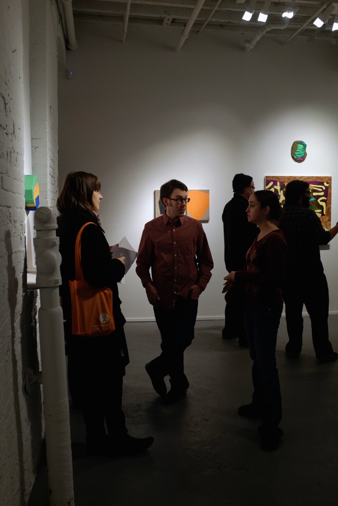 Visitors at the PAIR opening reception at PROTO Gallery