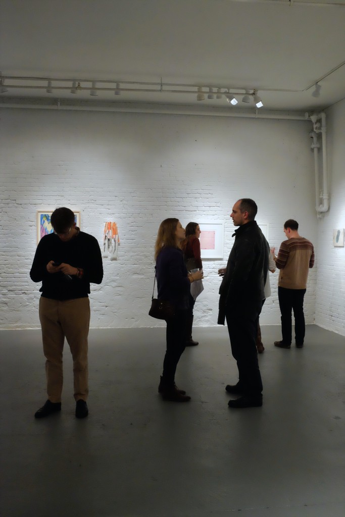 Visitors at the PAIR opening reception at PROTO Gallery