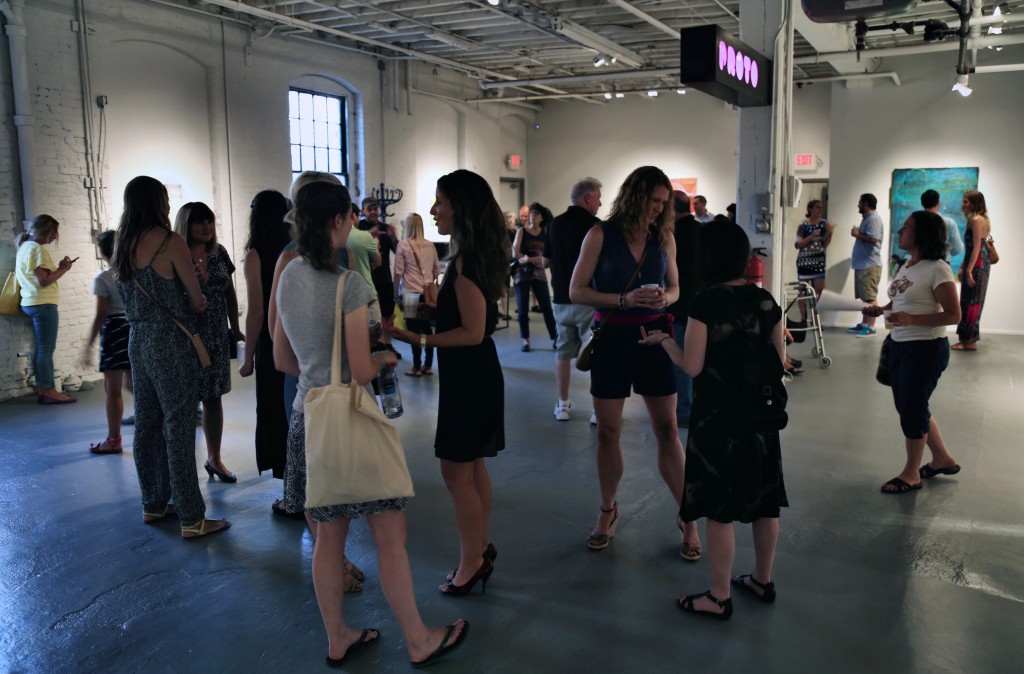 Visitors to PROTO Gallery attending the WE ARE WHAT THE SEAS HAVE MADE US opening reception