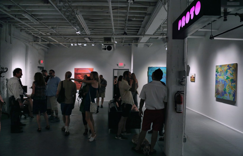 Visitors to PROTO Gallery attending the WE ARE WHAT THE SEAS HAVE MADE US opening reception